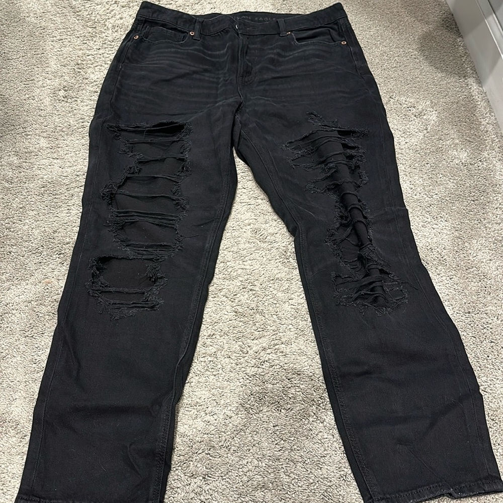 Black shredded jeans